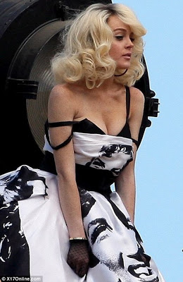 Lindsay Lohan. Note the Marilyn face on her dress.